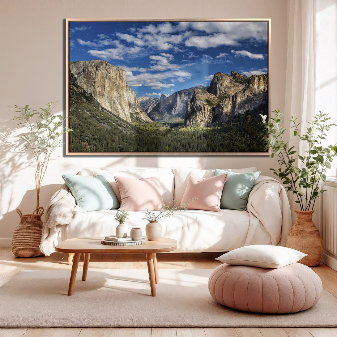 Framed Wall Art of Yosemite Valley in a modern living room. Earthy tones with blue sky and green trees. Elevate your space with this stunning print.