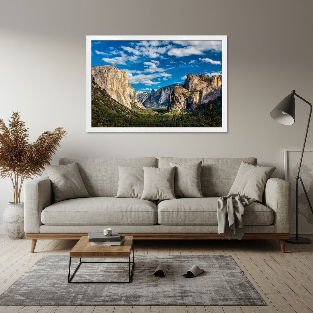 Framed Poster of Yosemite Valley landscape art, featuring majestic mountains, blue sky, and a natural color palette. Perfect wall decor!