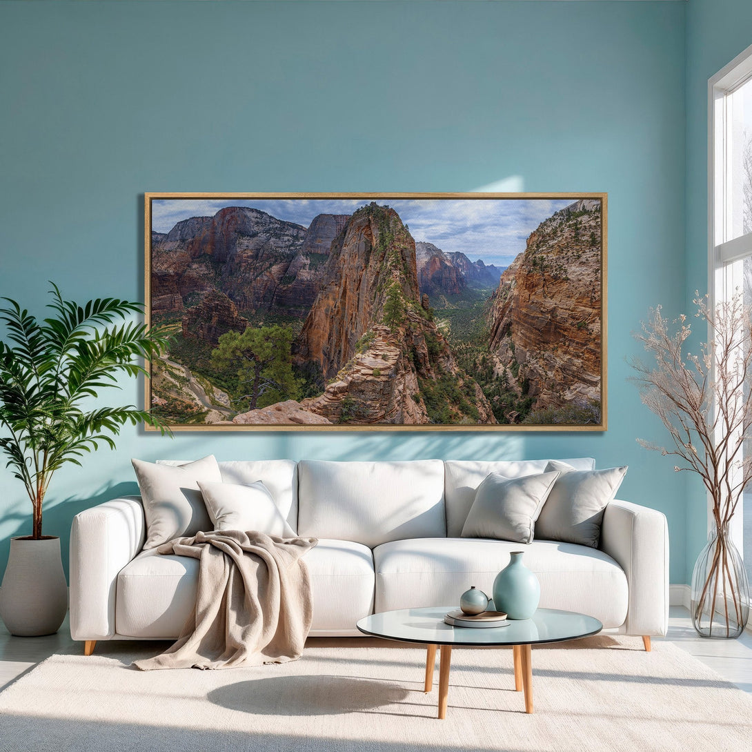 Framed Wall Art featuring a stunning mountain landscape. Earthy tones and a serene blue palette create a calming atmosphere. Elevate your space with this beautiful print.